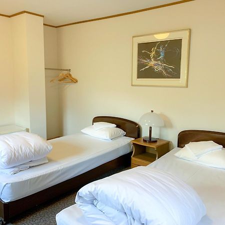 Niseko Ski Lodge - Higashiyama Pokoj fotografie