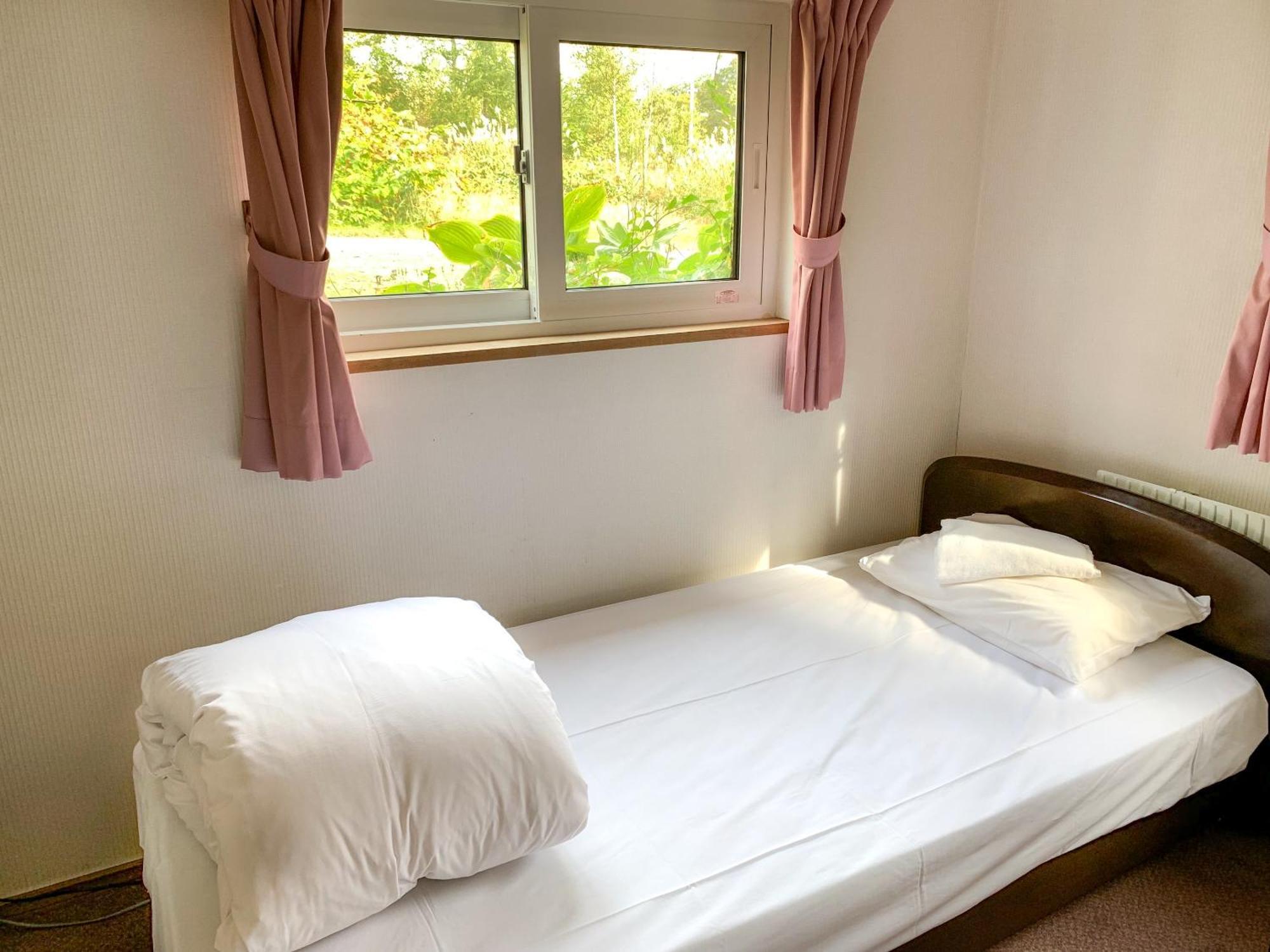 Niseko Ski Lodge - Higashiyama Pokoj fotografie