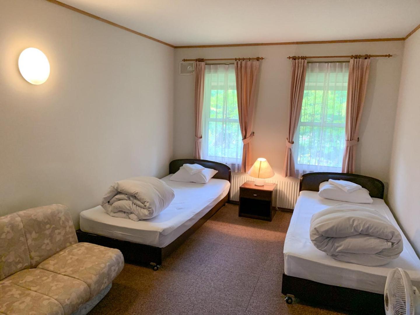 Niseko Ski Lodge - Higashiyama Pokoj fotografie