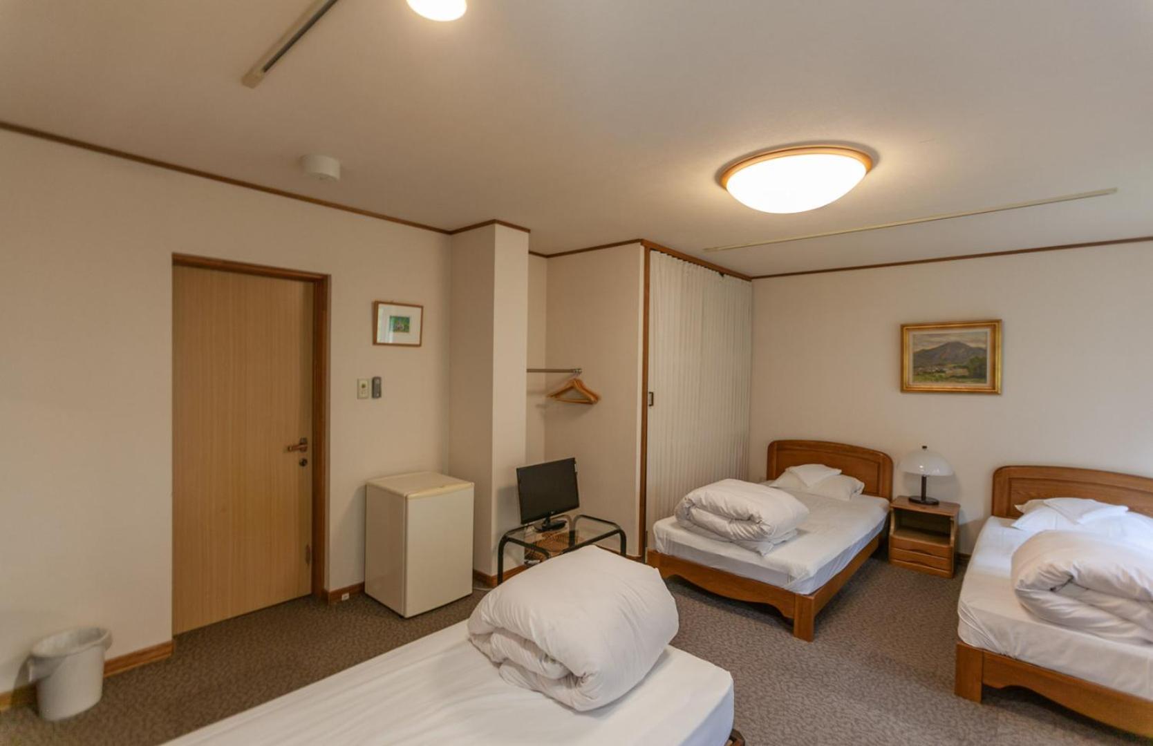 Niseko Ski Lodge - Higashiyama Pokoj fotografie